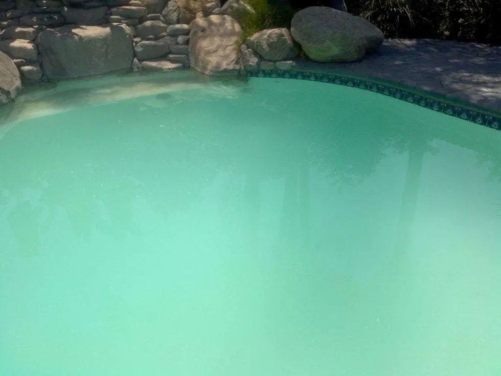 blue cloudy pool water after shocking