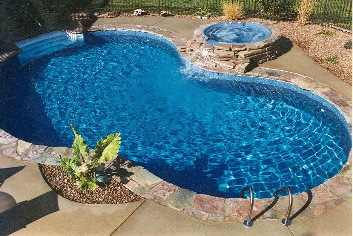 fiberglass pool with hot tub