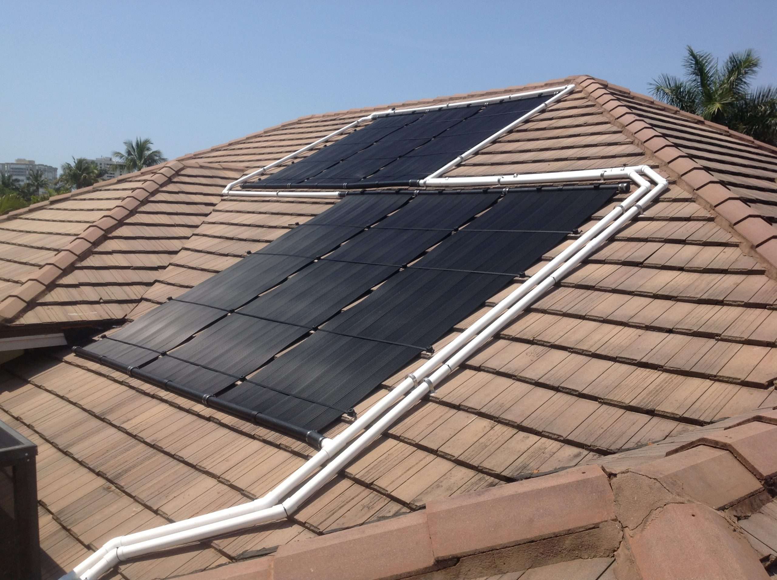 Naples Flat Tile Roof Gets Solar Pool Heater