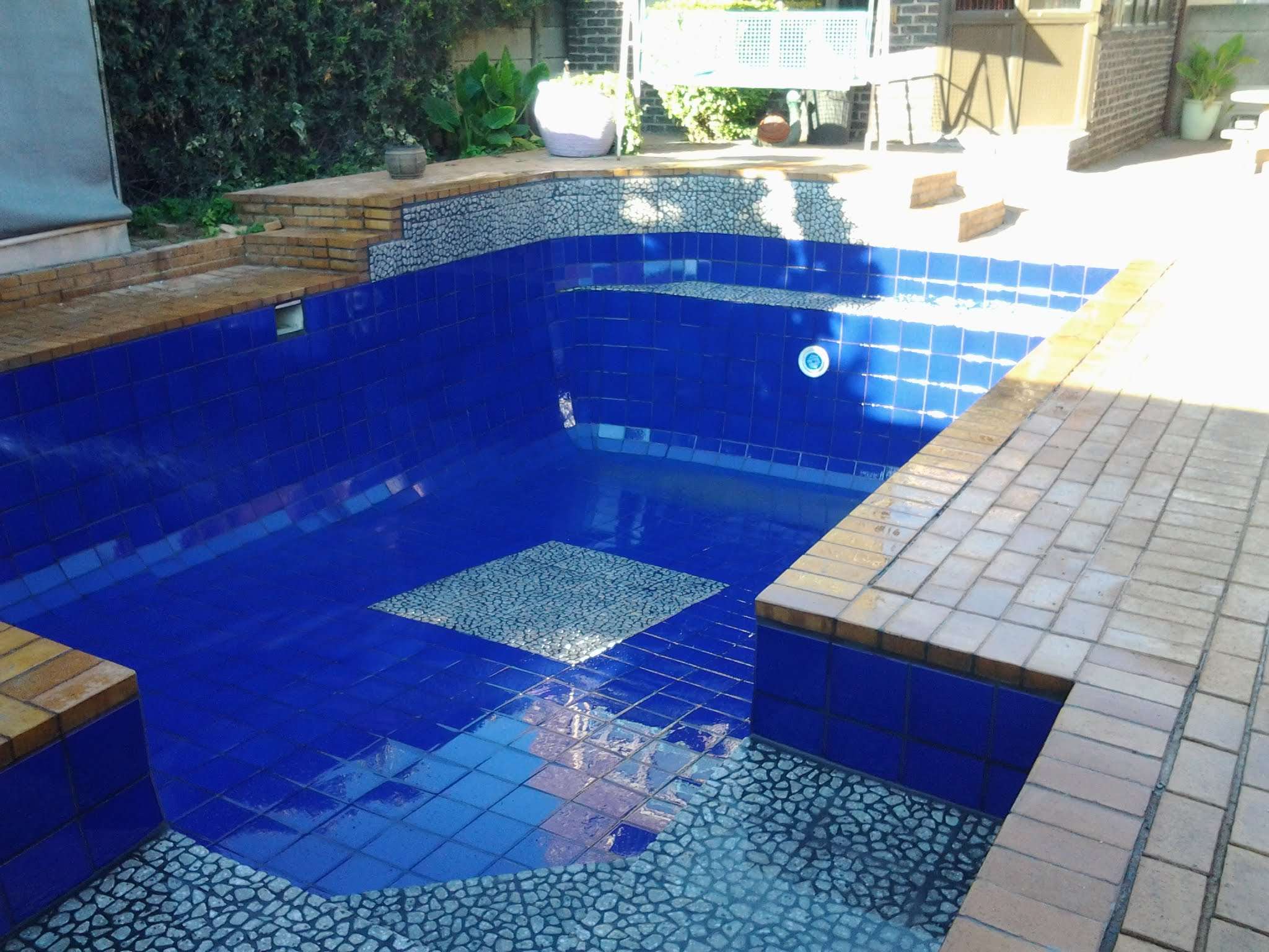 Painted Pool Tile Installation
