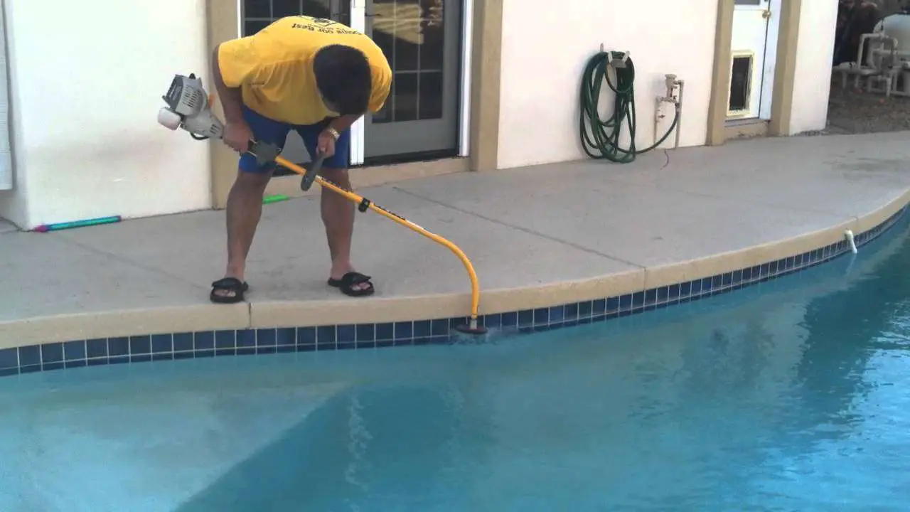 Removing calcium line from pool.