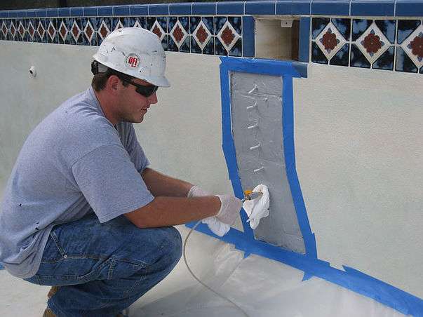 Repair a cracked wall in an inground concrete pool.