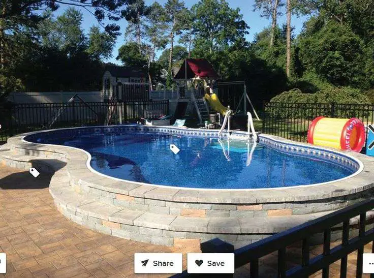 Semi above ground pool with paver edge