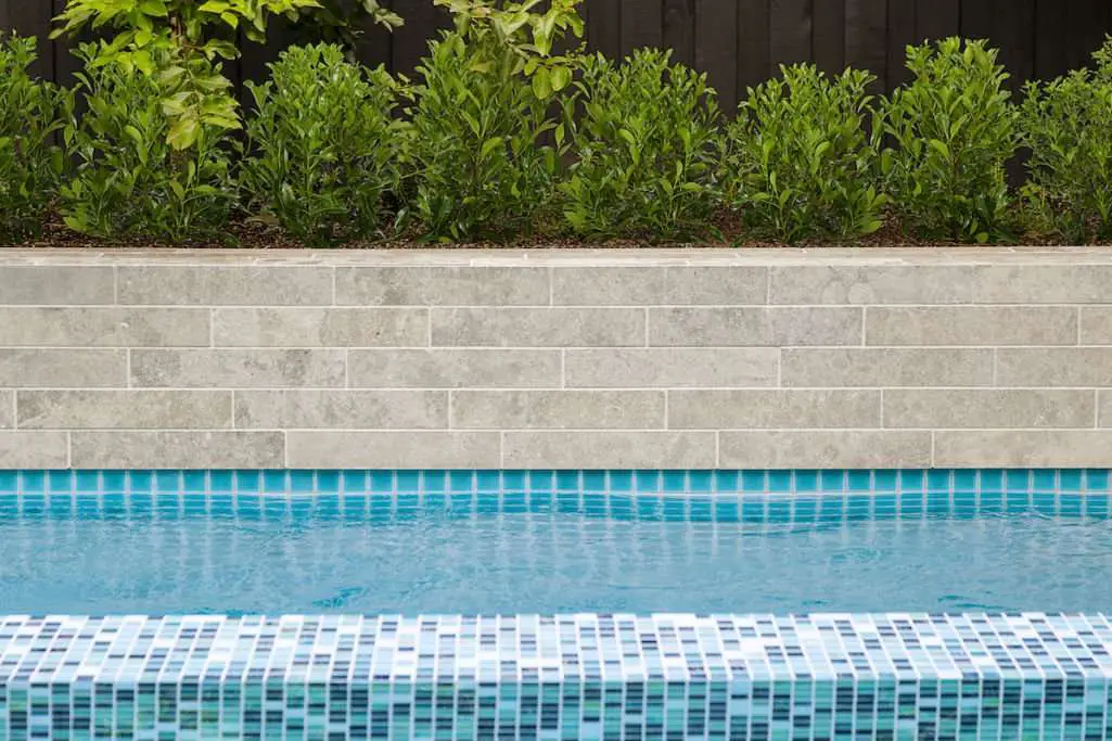 Tips for cleaning waterline pool tiles